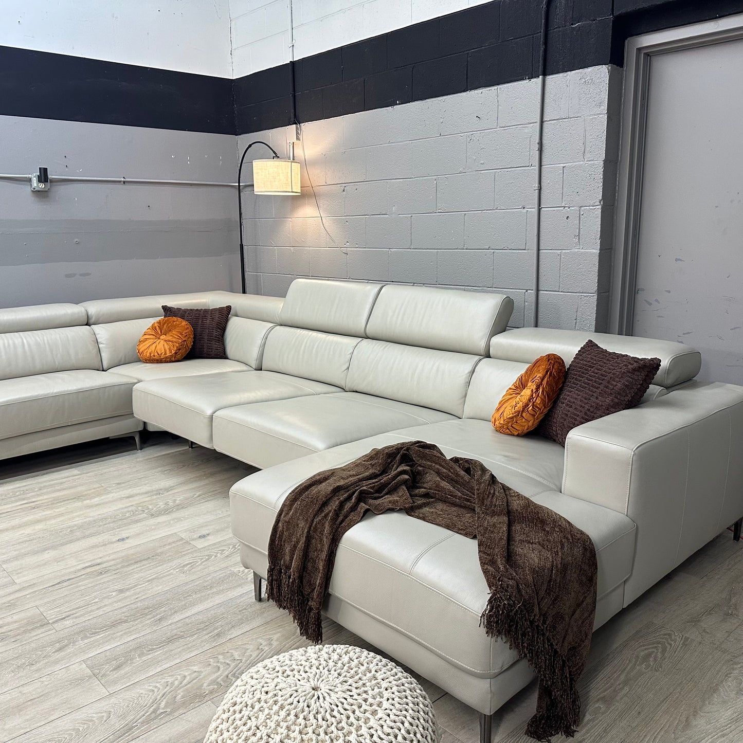 Claudius Leather Sectional with Power Seats and Adjustable Headrest