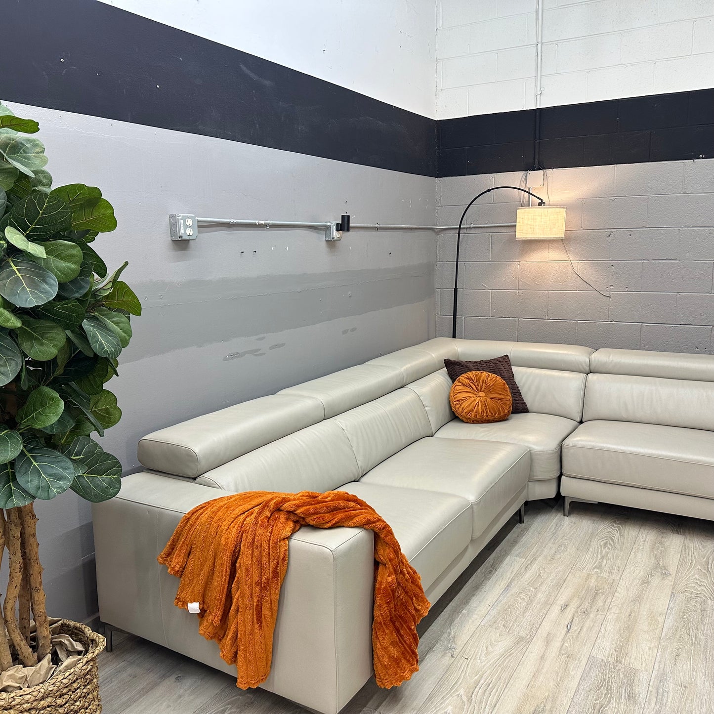 Claudius Leather Sectional with Power Seats and Adjustable Headrest