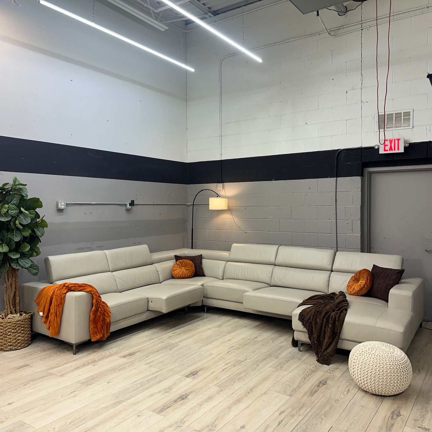 Claudius Leather Sectional with Power Seats and Adjustable Headrest